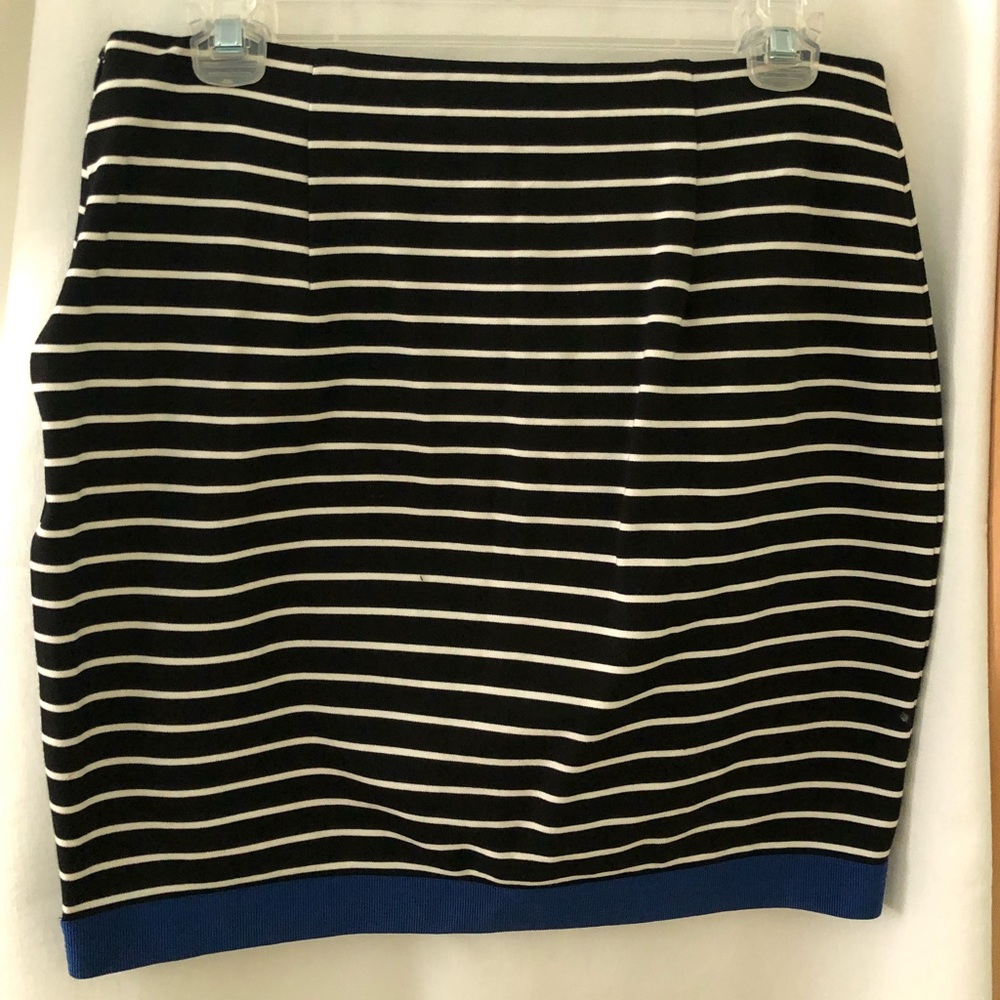 Stretch, side zipper, 17” long, unlined, black